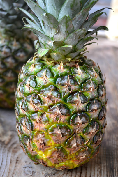 Fresh pineapple on wooden table - Fotografie, Obrázek