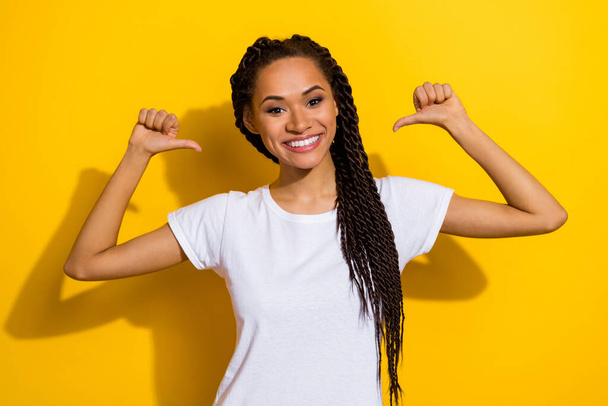 Portrait of positive nice lady point thumb fingers self myself beaming smile isolated on yellow color background. - Photo, Image