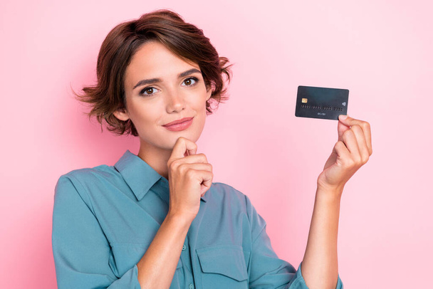 Photo of young pretty adorable nice cute positive minded girl touch chin thoughtful about buy new clothes hold credit card isolated on pink color background. - Фото, зображення
