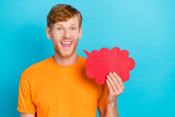 Photo of funny red hair guy say wear orange t-shirt isolated on teal color background. - Foto, Imagem