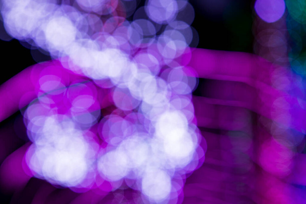 Purple pink Defocus Abstract bokeh light effects on the night black background texture - Foto, Imagem