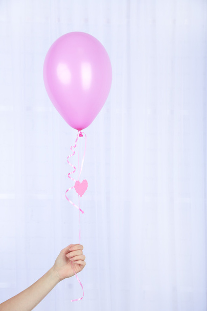 Hand holding balloon - Photo, Image