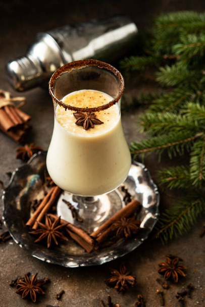  Homemade eggnog in glass on  dark   surface, selective focus with shallow depth of the field - Foto, Imagem