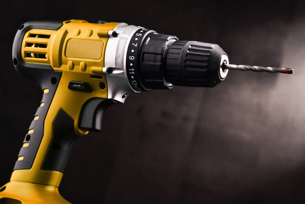 Cordless drill with drill bit working also as screw gun. - Photo, Image