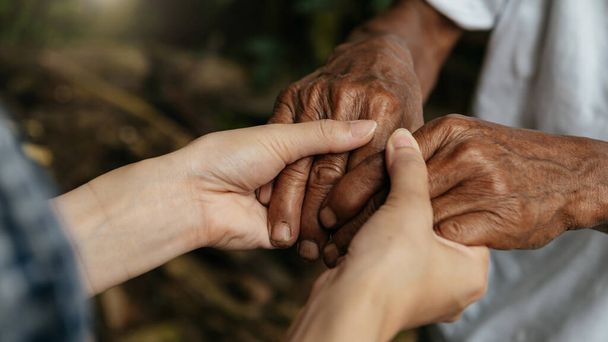 woman hands on old man Hands with wrinkle, nursing care  - Zdjęcie, obraz