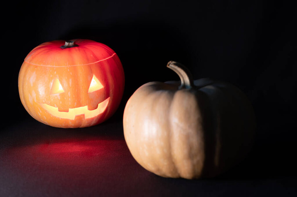 Halloween pumpkin on a black background - Фото, изображение