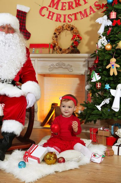 Santa Claus with little girl - Фото, зображення