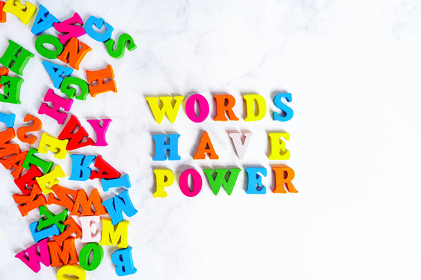 Creative words have power lettering made from colorful wooden characters on white. - Фото, зображення