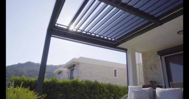 Pergola awning in the sunshine 4K video - Footage, Video