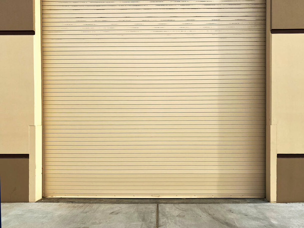 a shipping doors warehouse roll up door loading dock garage brick alley building street storage - Photo, Image