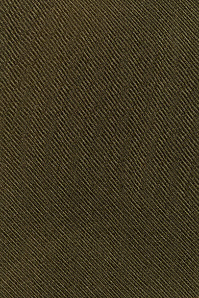 Bruine kleurstof doek polyester textuur en textiel achtergrond. - Foto, afbeelding