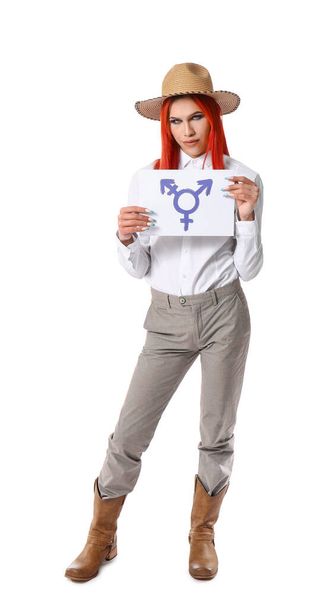 Stylish transgender woman holding paper sheet with transgender symbol against white background - Photo, Image