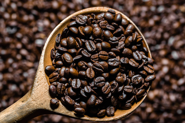 Aromatic coffee beans, background texture. - Фото, зображення
