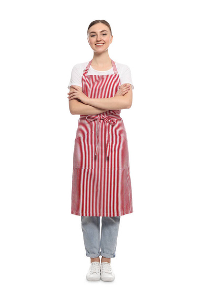 Beautiful young woman in clean striped apron on white background - Zdjęcie, obraz