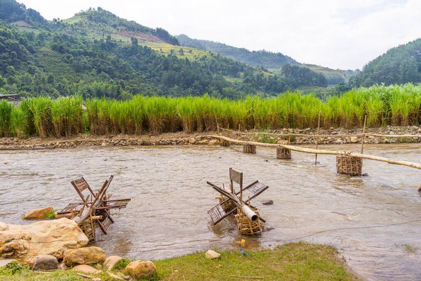 view of Water mill in Mu Cang Chai, Yen Bai province, Vietnam in a summer day. Travel and landscape concept. - Photo, Image