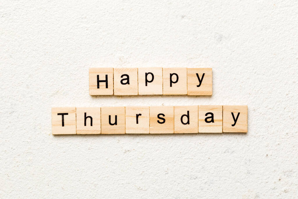 Happy thursday word written on wood block. Happy thursday text on cement table for your desing, concept. - Photo, Image