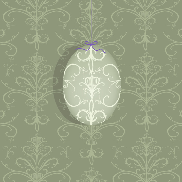 Huevo de Pascua colgando de una cuerda púrpura
 - Foto, imagen