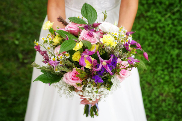 wedding bouquet in bride's hands - Photo, Image