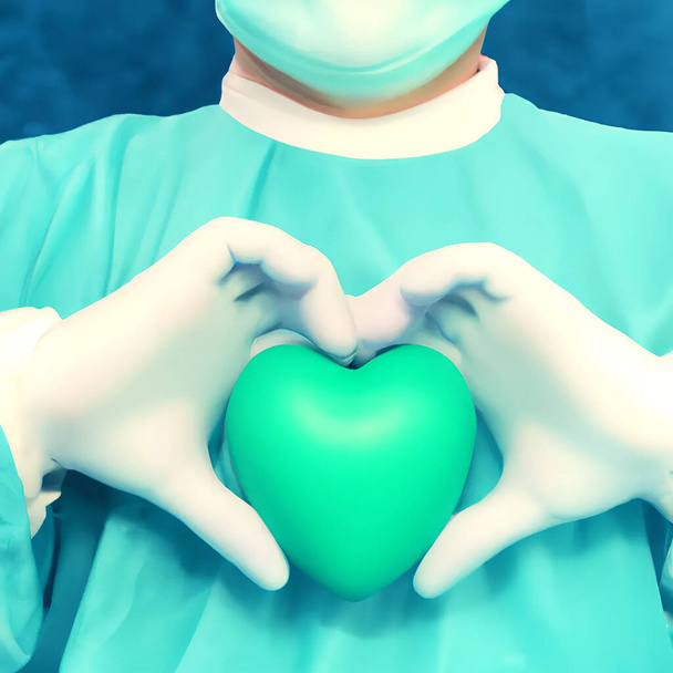 Surgeon holding a green hearth on hands - Photo, Image