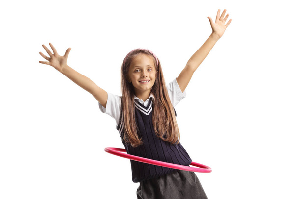 Smiling happy girl playing with a hula hoop isolated on white background - Φωτογραφία, εικόνα
