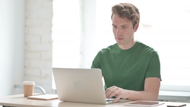 Frustrated Angry Casual Young Man Working on Laptop  - Footage, Video