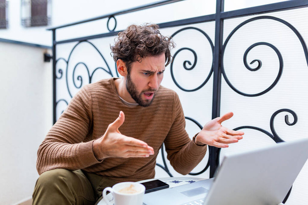 Furious man angry about bad news online or pc software failure, mad helpless office worker having problem with broken laptop, stressed student hates computer crash, user indignant about data loss - Photo, Image
