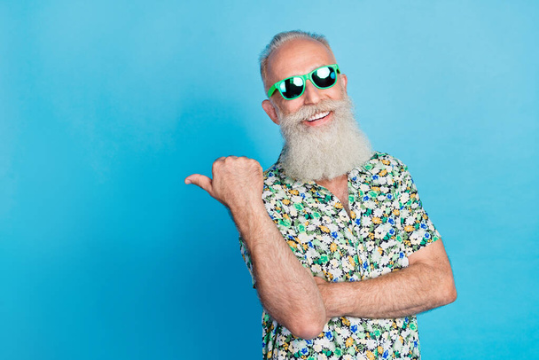 Closeup photo of old gray mustache bearded positive smile finger point empty space advert summer season chill agency isolated on bright blue color background. - Foto, Imagem