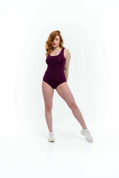 model size posing bodysuit on white background - Foto, Imagem