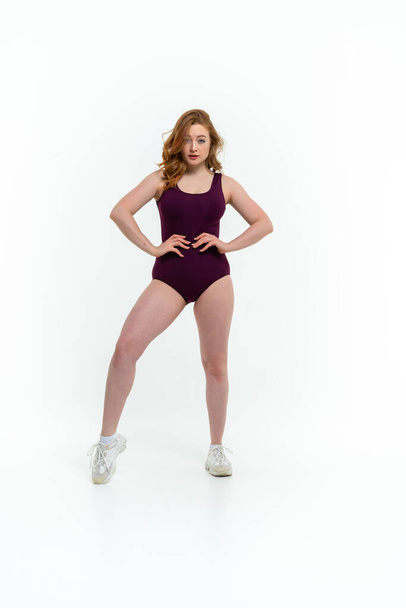 model size posing bodysuit on white background - Valokuva, kuva