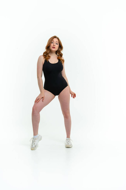model size posing bodysuit on white background - Zdjęcie, obraz