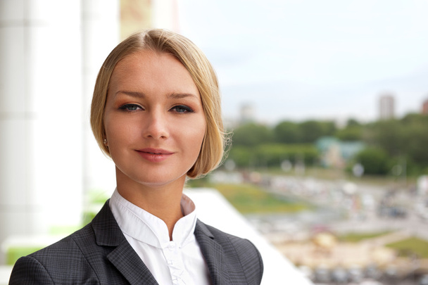 Closeup portrait of cute young business woman smiling - Photo, Image