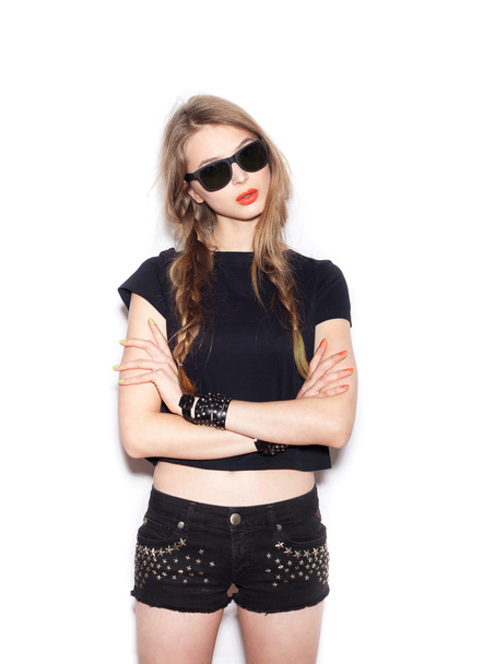 Fashion girl hipster with two long braids in sunglasses  - Φωτογραφία, εικόνα