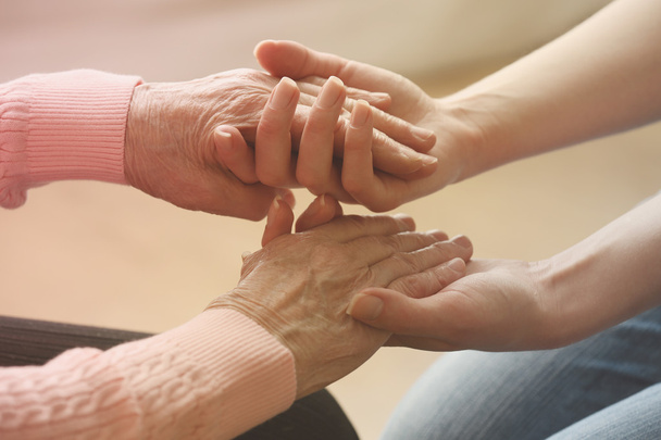 Helping hands, care for the elderly concept - Photo, Image