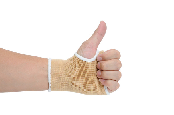 Man hand met polssteun bescherming - Foto, afbeelding