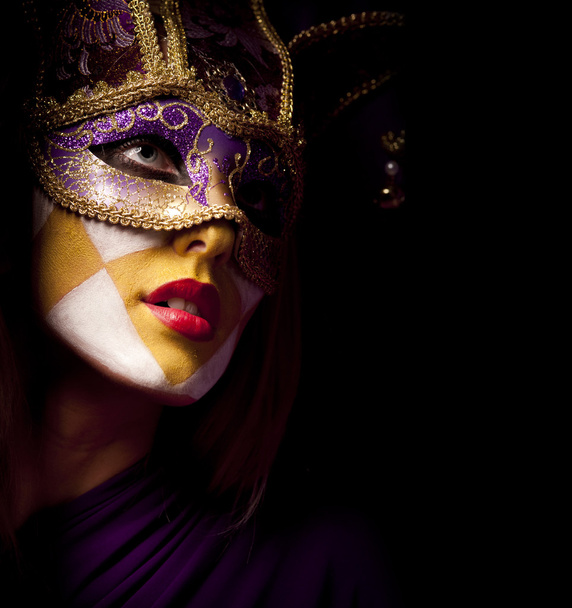 Portrait of sexy woman in violet party mask - Foto, imagen