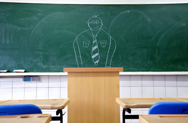 Piirrä opettaja liitutaululle koulun luokkahuoneessa
 - Valokuva, kuva