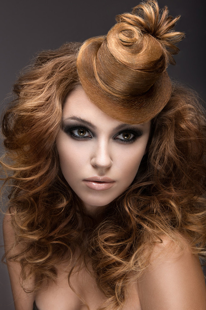 Beautiful woman with evening make-up and hairstyle as a cap of hair. Beauty face. - Foto, Imagem