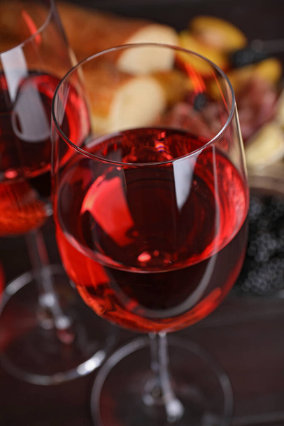 Glasses of delicious rose wine on table, closeup - Photo, Image