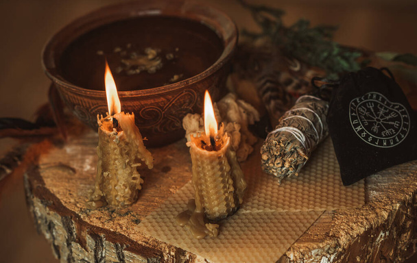  Candle burns on the altar, candles magic, clean aura and negative energy, wicca concept - Photo, Image