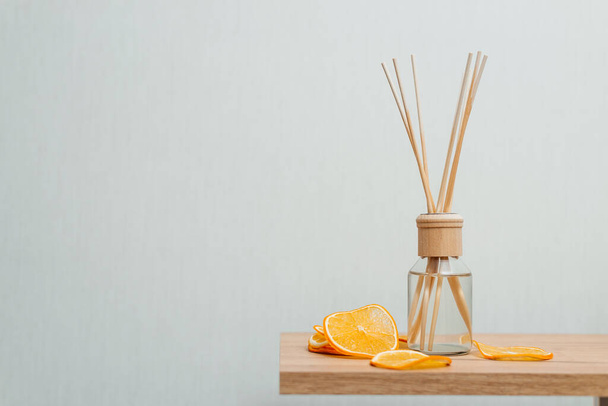 Citrus reed diffuser on white background. - Fotoğraf, Görsel
