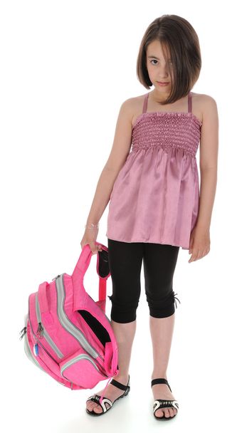 Sad schoolgirl standing with bag. - Foto, Imagen