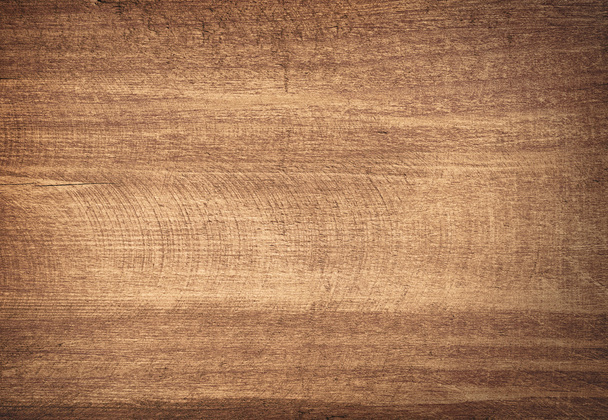 Bruin gekrast houten snijplank. - Foto, afbeelding