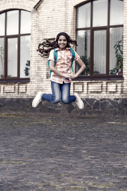 Happy school time. Energetic kid jump outdoors. Back to school. School education. Happy learning. Private teaching. Home schooling. Happy international childrens day. - Foto, imagen