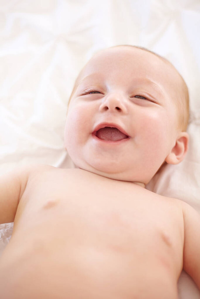 Adults are such silly creatures. Cute little baby laughing happily - Valokuva, kuva