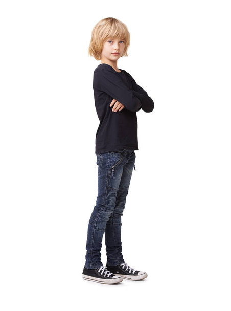 Shes sharp and smart. Portrait of a pretty little girl standing with arms crossed against a white background - Foto, Bild