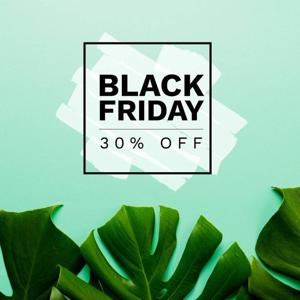 Composition of black friday text over shapes and leaves. Black friday and celebration concept digitally generated image. - Photo, image
