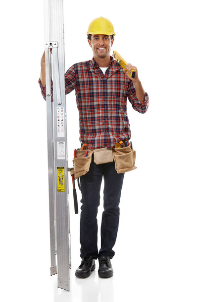 Everybody needs a handyman. a handyman holding his ladder - Фото, зображення