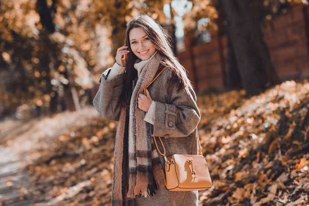 Photo of pretty cute lady businesswoman going work enjoy morning autumn weather dressed warm modern outfit overcoat good mood outdoors. - Φωτογραφία, εικόνα