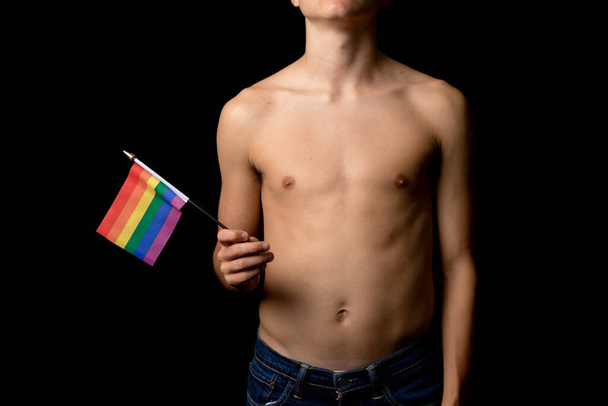 A Shirtless 19 Year Old Teenage Boy with Pride Flags - Photo, Image