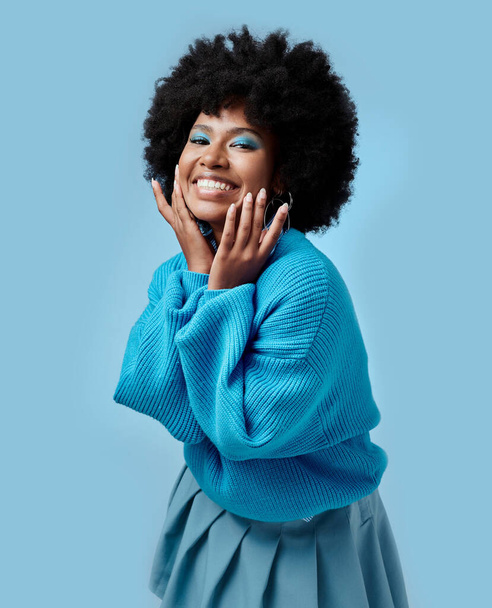 African beauty, makeup and portrait of a black woman with blue eyes shadow, face cosmetics and afro hair or good skin. Funk, smile and young happy girl with vintage, retro and creative fashion style - Fotoğraf, Görsel
